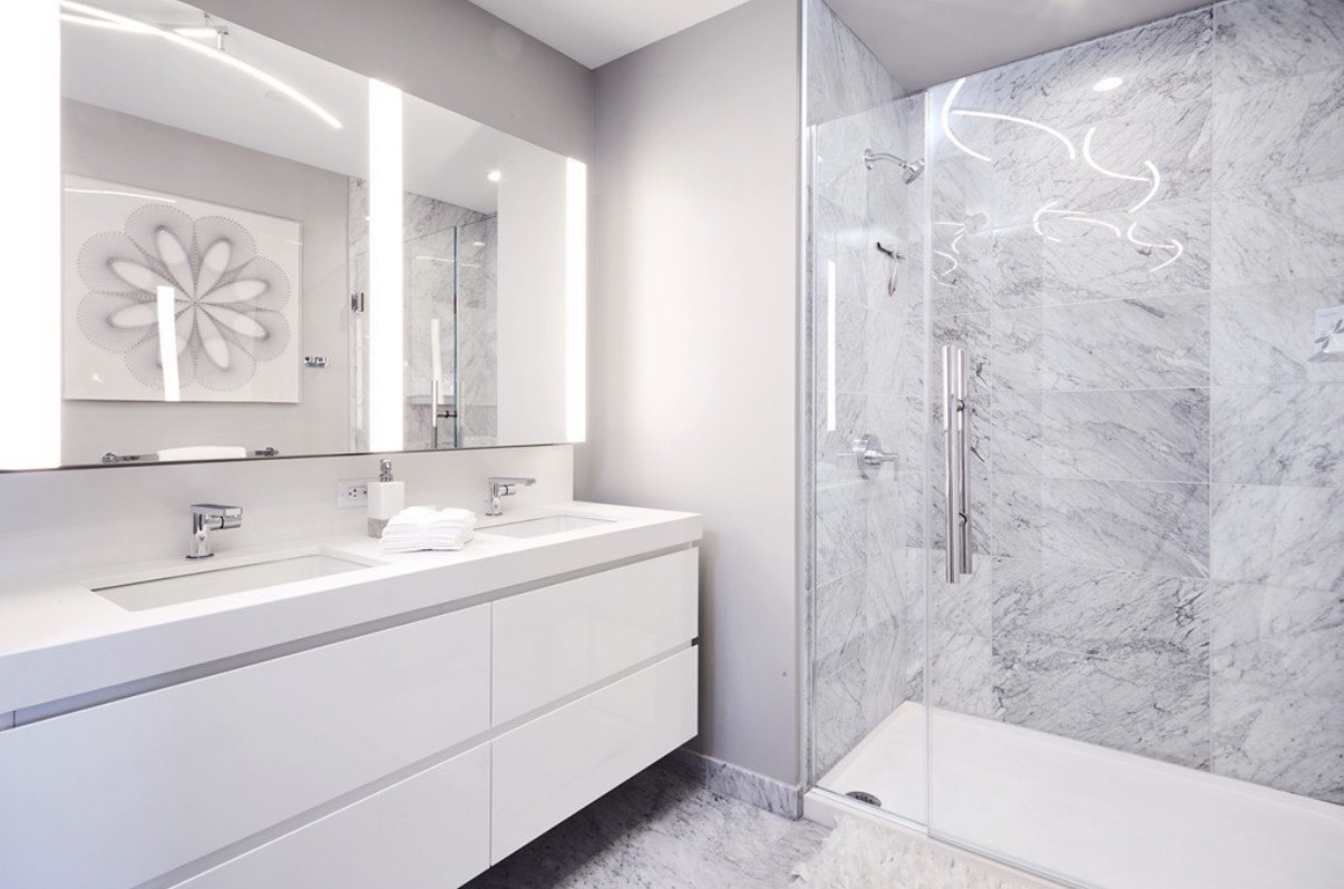 Marble master bathroom with double vanity