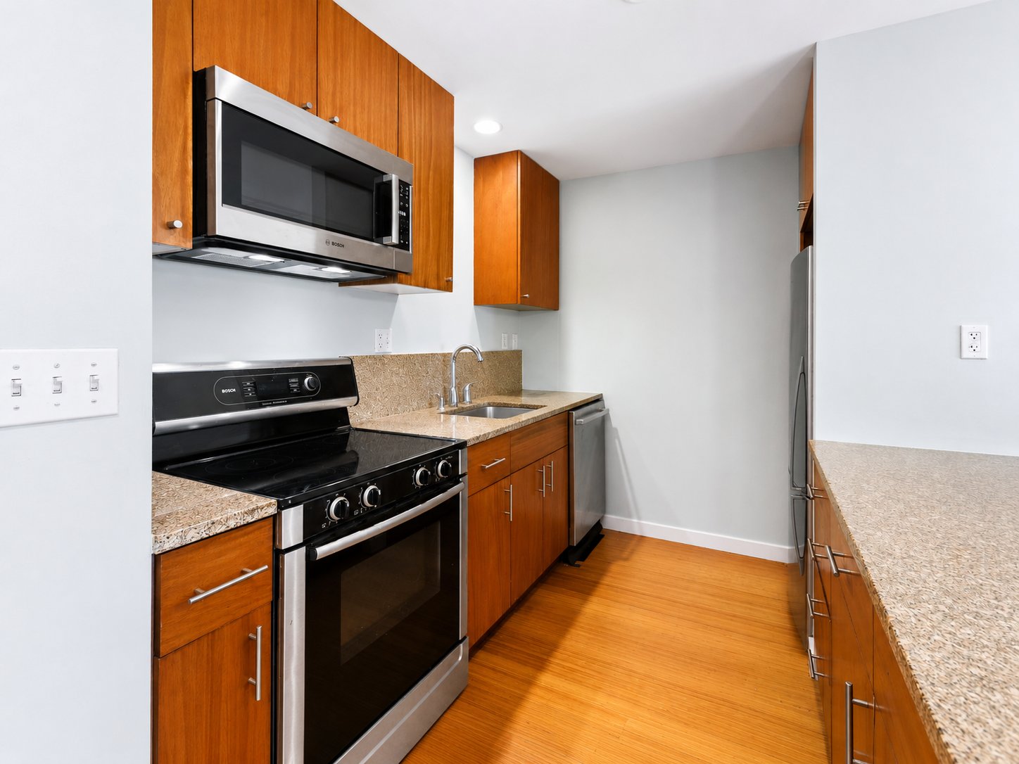 Deep-cleaned kitchen with stainless appliances